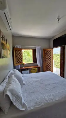Uma cama ou camas num quarto em La Consta