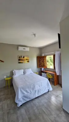 Uma cama ou camas num quarto em La Consta