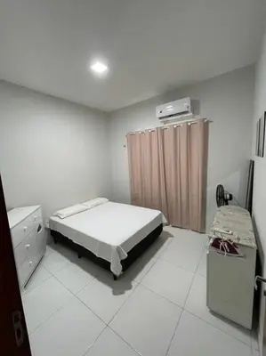 Uma cama ou camas num quarto em Casa Miguel Arcanjo