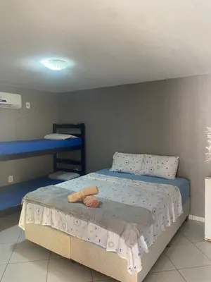 Uma cama ou camas num quarto em Portal do Sol