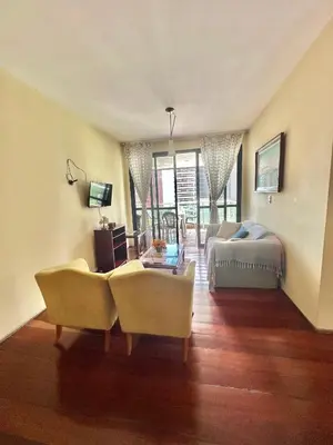 Uma área de estar em Refúgio Familiar em Meireles - Natureza & Conforto