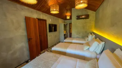 Uma cama ou camas num quarto em Carnaúba Hotel Boutique