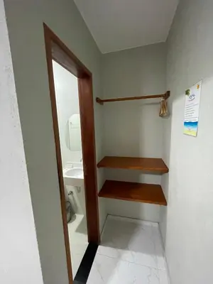 Uma casa de banho em Suítes Paraíso Perfeito