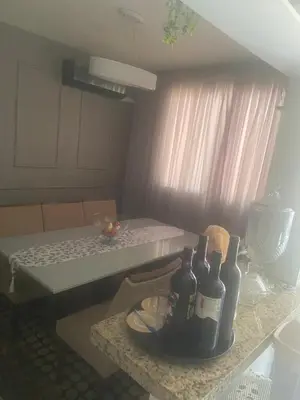 Uma cama ou camas num quarto em Carlos meu ape