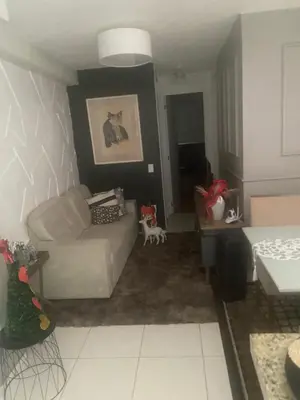 Uma área de estar em Carlos meu ape