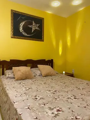 Uma cama ou camas num quarto em Portal do Sol