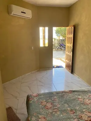 Uma cama ou camas num quarto em Portal do Sol