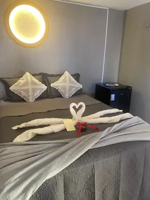 Uma cama ou camas num quarto em Portal do Sol