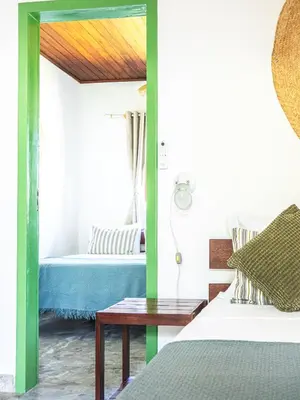 Uma cama ou camas num quarto em Kite Oasis Parajuru Casa Branca