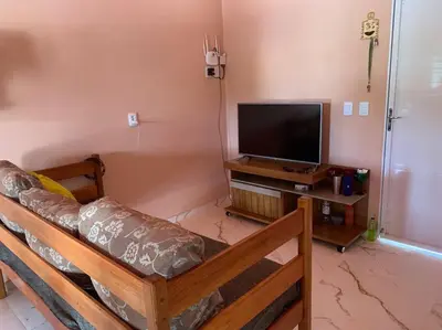 Uma televisão e/ou sistema de entretenimento em Casa em Jijoca de Jeriquaquara