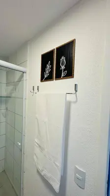 Uma casa de banho em Apto com varanda e vista mar em condomínio Clube