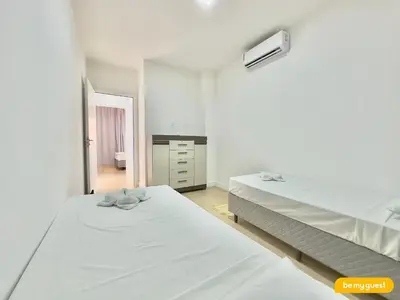 Uma cama ou camas num quarto em Bella Arte Porto das Dunas