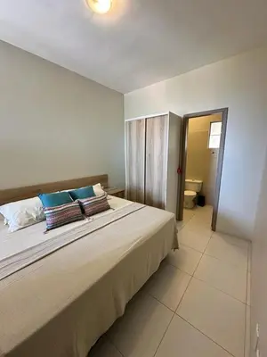 Uma cama ou camas num quarto em Cumbuco Residence