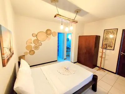 Uma cama ou camas num quarto em Pousada e Restaurante Nomads Lagoa