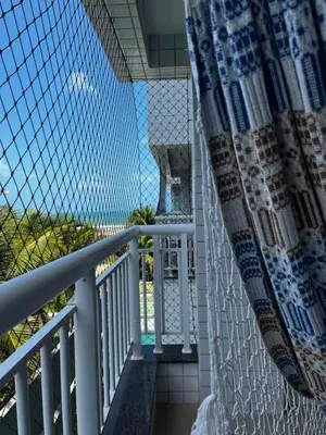 Uma varanda ou terraço em Beach Way, ap pé na areia, no Porto das Dunas, pertinho do Beach Park