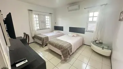 Uma cama ou camas num quarto em Casa Dunas
