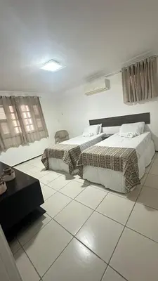 Uma cama ou camas num quarto em Casa Dunas