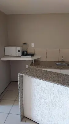 A cozinha ou kitchenette de REDE APARTHOTEL Praia Mansa
