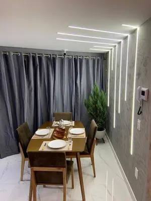 Uma área de estar em Apartamento de luxo na Beira Mar