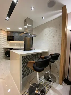 A cozinha ou kitchenette de Apartamento de luxo na Beira Mar