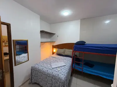 Uma cama ou camas num quarto em Flatmobiliadofortaleza