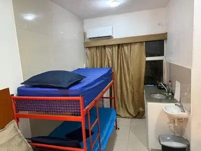 Uma cama ou camas num quarto em Flatmobiliadofortaleza