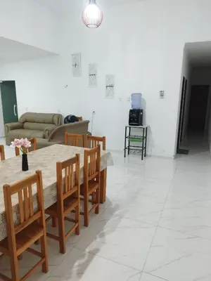 Uma área de estar em Casa Praia Paracuru - Orquídeas de Célia