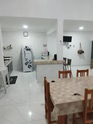 A cozinha ou kitchenette de Casa Praia Paracuru - Orquídeas de Célia