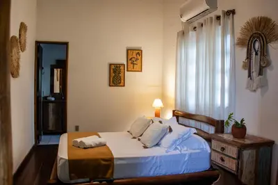 Uma cama ou camas num quarto em Vila Sofia