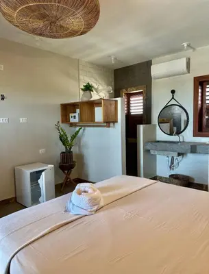 Uma cama ou camas num quarto em Refúgio prea