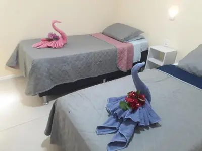 Uma cama ou camas num quarto em Flecheiras Residence