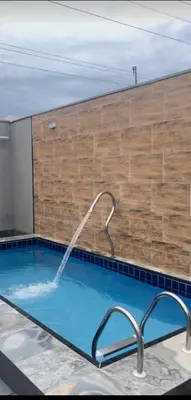 A piscina em ou perto de Paracuru casa temporada Villa Ariane