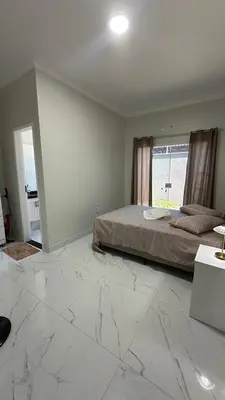 Uma cama ou camas num quarto em Paracuru casa temporada Villa Ariane