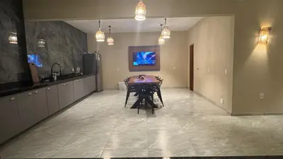Uma televisão e/ou sistema de entretenimento em Casa Morada dos Ventos - Praia do Preá