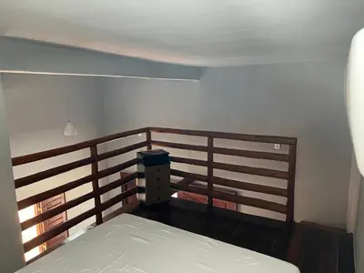 Uma cama ou camas num quarto em Pousada Califa Taíba