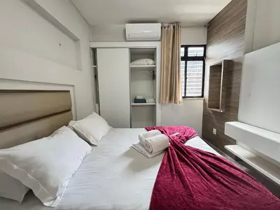 Uma cama ou camas num quarto em New Life Meireles Vista Mar by Escala Imoveis