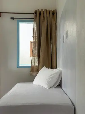 Uma cama ou camas num quarto em Vento do Ceará -Kitesurfing House- Preá
