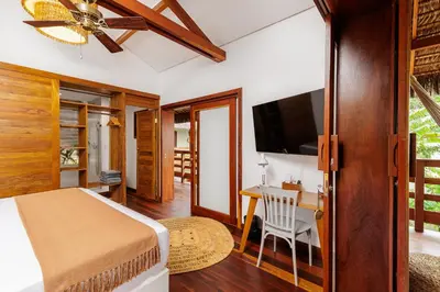 Uma cama ou camas num quarto em Deluxe Villa Luz Do Mar, rooftop Jacuzzi, vista mar