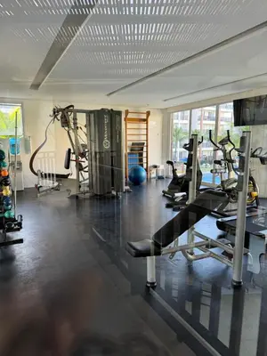 O centro de fitness e/ou as comodidades de fitness de Apartamento Beach Park Living Resort Porto das Dunas