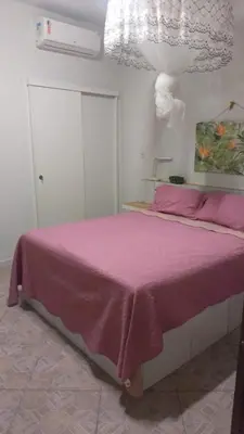 Uma cama ou camas num quarto em Casa China & Silva, Otima Casa para praia ou descanso, proximo as Dunas da Sabiaguaba e shoppings em Eusebio e Fortaleza Ce