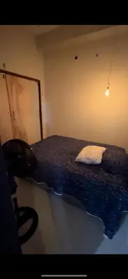 Uma cama ou camas num quarto em Casa astro rei