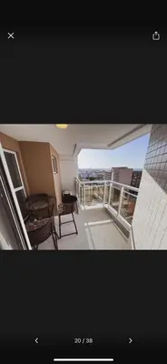 Uma área de estar em Flat frente mar