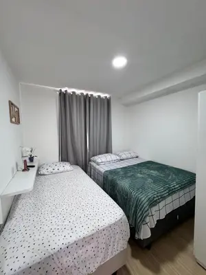Uma cama ou camas num quarto em MIRANTE Clube 803 T3
