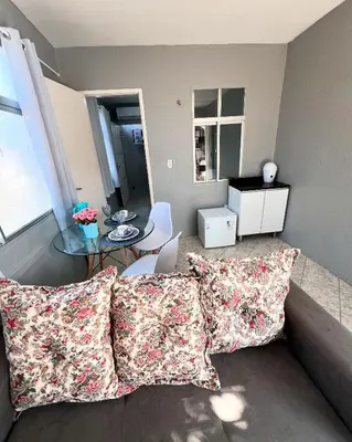 Uma área de estar em Apartamento completo com GARAGEM!Casa Taíba!