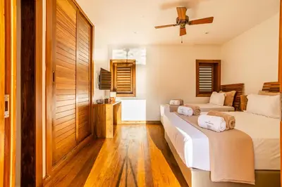 Uma cama ou camas num quarto em Villa Shamsa - Grupo Messina