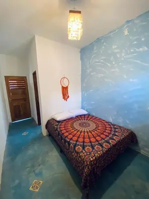 Uma cama ou camas num quarto em Stone Guajiru