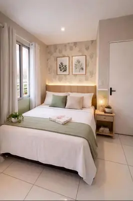 Uma cama ou camas num quarto em Pousada Meu Aconchego
