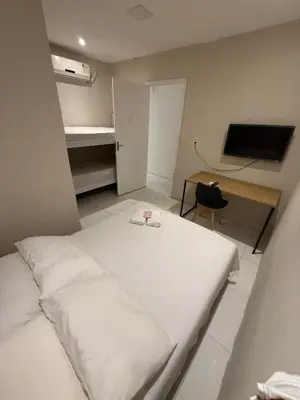 Uma cama ou camas num quarto em Pousada Meu Aconchego