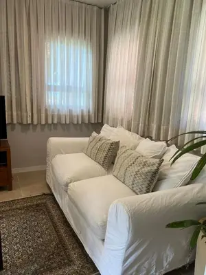 Uma área de estar em Cumbuco Dream