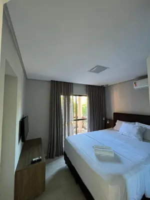 Uma cama ou camas num quarto em Cumbuco Dream